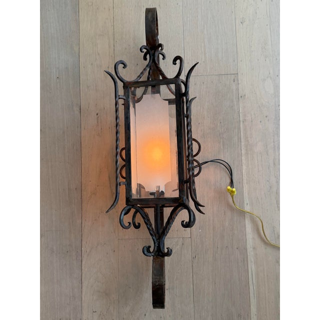 Early 20th century vintage Gothic/Spanish revival exterior wall scone. This came from an old Hollywood style Spanish home....