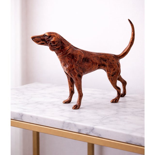 Enhance your home décor with this elegant antique-style dog sculpture, beautifully crafted from real metal and finished in...