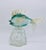 Offered for sale is a Archimede Seguso for Girolamo Luxardo Murano glass fish standing on a transparent glass bottle in...
