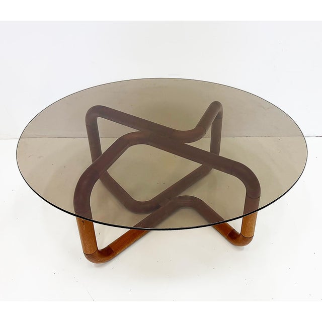 Danish Modern Biomorphic Teak Coffee Table, Uldum Møbelfabrik Smoked Glass Top Offered for sale is a vintage Danish Modern...