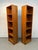 Beautiful pair of vintage mid century modern teak bookcases featuring a clean Danish-inspired design with rich teak grain...