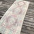 A Vintage Avanos Runner with Geometric Depth and Tribal Charm This vintage runner rug from the Avanos region of Turkey is...