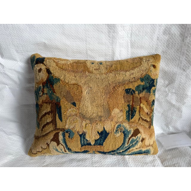 This rare decorative pillow has been created from an original 17th Century Brussels tapestry, preserving a remarkable...