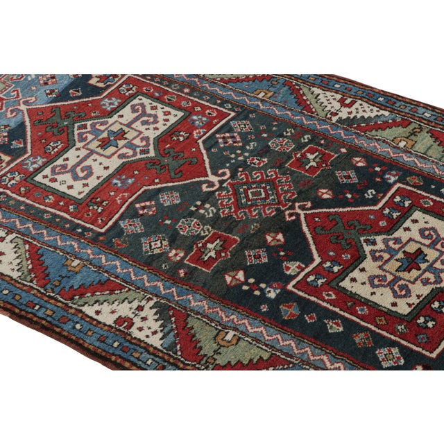 Originating from Russia between 1890-1900, this antique Shirvan runner has one of the widest varieties of eastern symbols,...