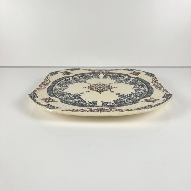 Square plate/dish by Longchamp, "Diane" pattern, polychrome earthenware, late 19th century. Dimensions: 26 x 26 cm Height:...