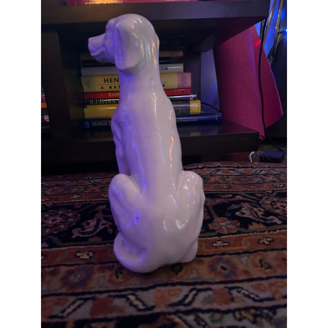 White Vintage hand made Ceramic statue of a hunting dog. This statue would look great on a table, entry, garden or just...