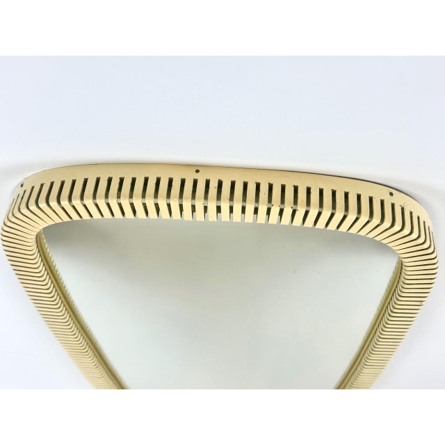 Mid-Century German Wall Mirror with Cut Metal Edge, 1950s, in Very Good conditions. Designed 1950 to 1959