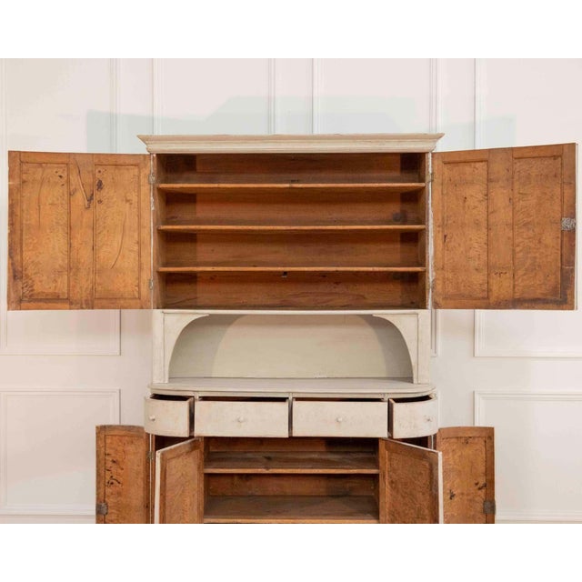 This 19th-century Swedish cabinet exemplifies the restrained elegance and functional craftsmanship characteristic of...
