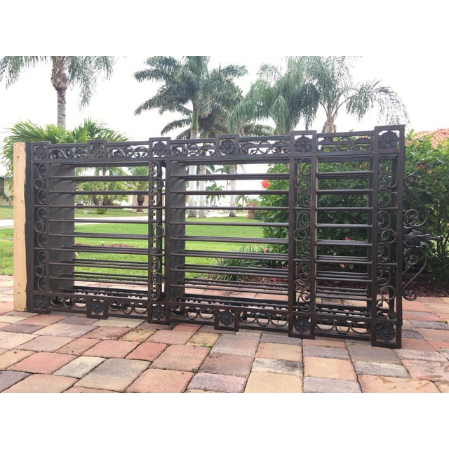 Custom made Italianate style iron wine racks. Flower motif detail, beautiful gunmetal color. These wine racks will hold up...