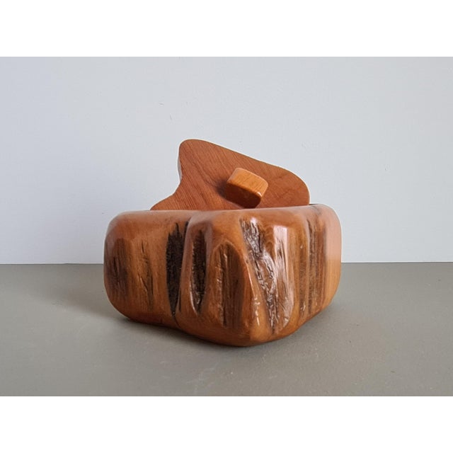 Vintage French decorative box in carved wood, crafted in the style of Alexandre Noll, an iconic figure of French organic...