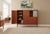 A fantastic Danish teak cabinet from the mid-1960s that combines elegant design with unusually generous storage options on...