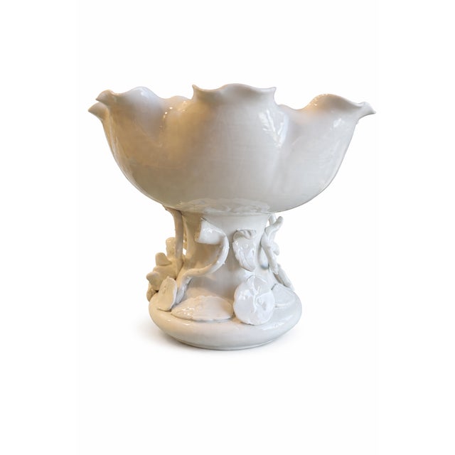 Elegant vintage blanc-de-Chine-style porcelain compote featuring a softly scalloped rim and sculptural fruit-and-vine...