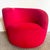 Embrace bold style with this vibrant postmodern Nautilus swivel chair. Upholstered in striking red fabric, this chair...