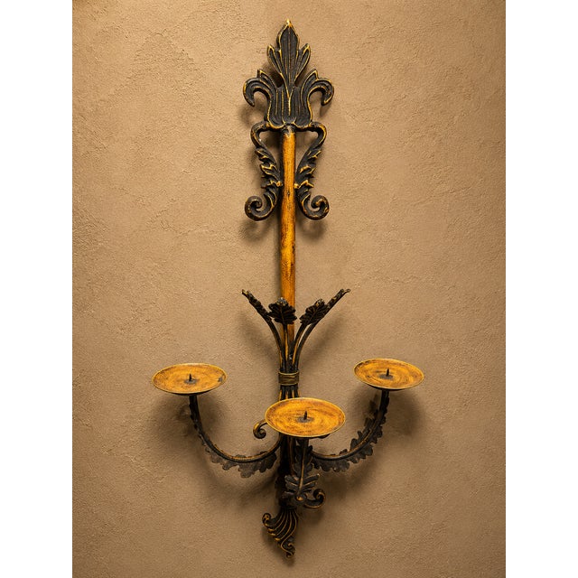 This French Louis XV wall sconce is a stunning addition to any room, exuding a vintage charm with their antique bronze...