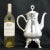 A recently re-silvered Victorian coffee pot that has that over-the-top Victorian look from the finial to the feet. The...