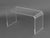 Modern Clear Acrylic Waterfall Coffee Table. 18" H x 30" W x 14" D. Provenance: From a Sutton Place Collection.
