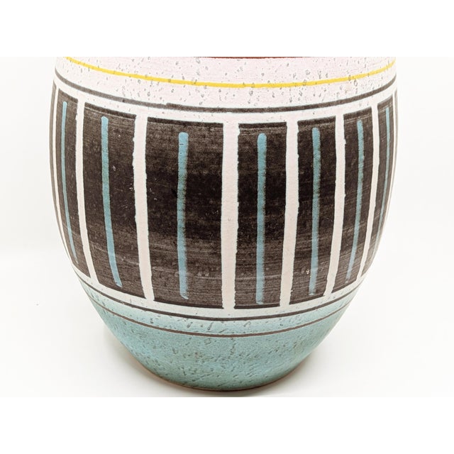 An extraordinary Mid-Century modern ceramic vase, produced in Germany during the 1960s. Featuring a classic...