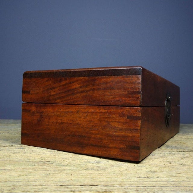 This is a beautiful vintage Chinese Huali (Rosewood) box, featuring exquisite Mother-of-Pearl (MOP) inlay on its lid. The...