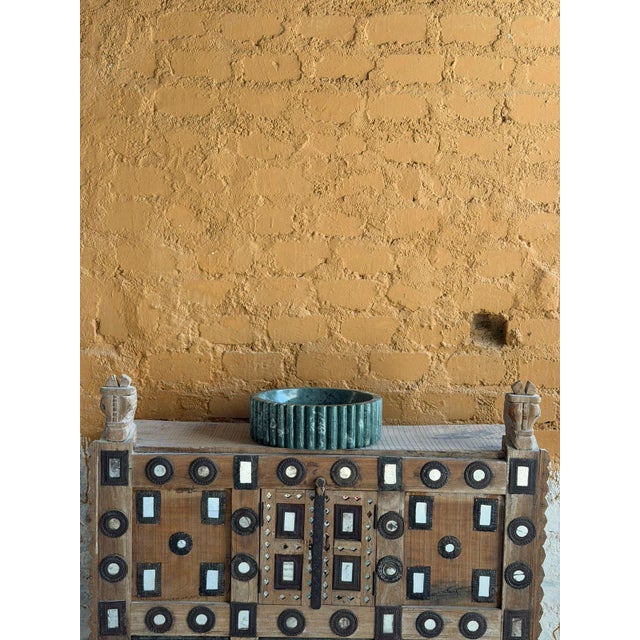 Handcrafted Green Marble Fluted Vessel Sink made from natural stone with a clean round shape, fluted outer design, and...