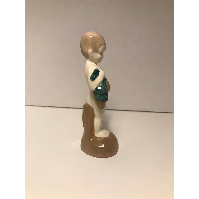 Antique Late 19th Century German Majolica Figurine of a Boy Holding Cones Aprox. dimensions: 6"H x 2"W Very good original...
