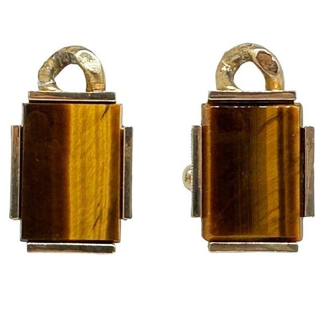 Pair of Mid-century Mad Men era Men's 10k gold plate whaleback cufflinks w/ Tigers Eye signed "S" with lines patterned...