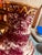 Thie is a Vintage Porcelain Pitcher (or Ewer) elegantly decorated with a maroon-red glaze, then hand-painted with florals,...