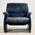 Leather armchair with curved shapes from the 1980s produced by De Sede. Thanks to its design and materials, it is an...