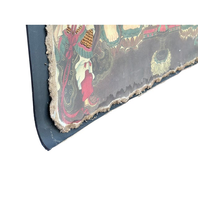 This captivating antique painting, likely a devotional piece from East Asian Buddhist tradition, portrays a central...