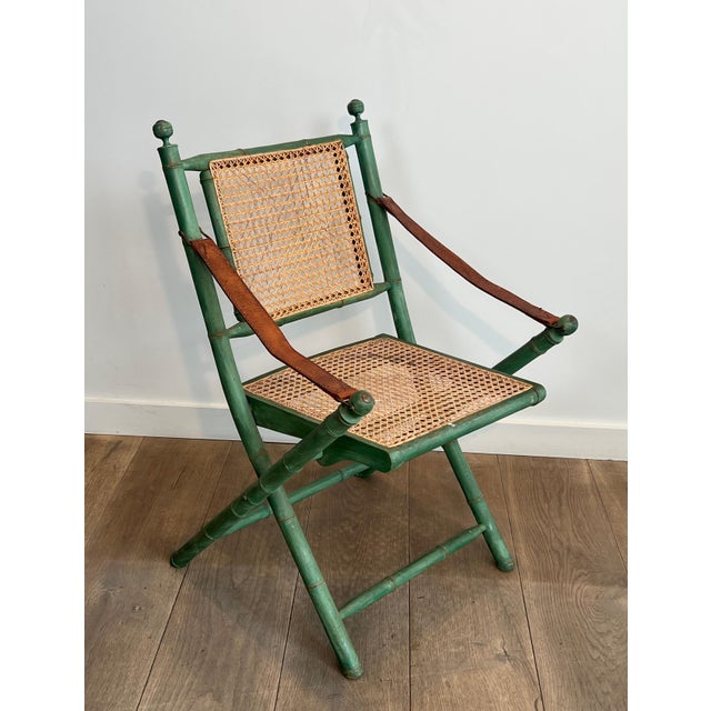 Pair of 1970s folding safari chairs in weathered faux bamboo with caned backs and seats For Sale - Image 6 of 12