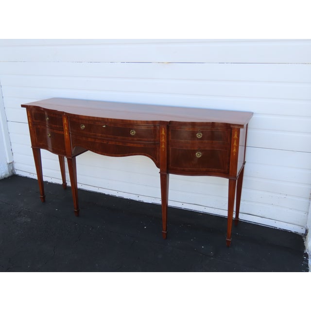 This wonderful Sideboard/Buffet is made out of wood, solid wood, mahogany, flame wood, and veneer. The Sideboard was made...