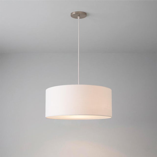The Stretch Pendant is a striking Pendant featuring a satin nickel steel body and a durable steel base, paired with a...
