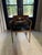 Sculptural pair of Danish Modern armchairs with the clean, organic lines and exposed wood frames that define the era. Warm...
