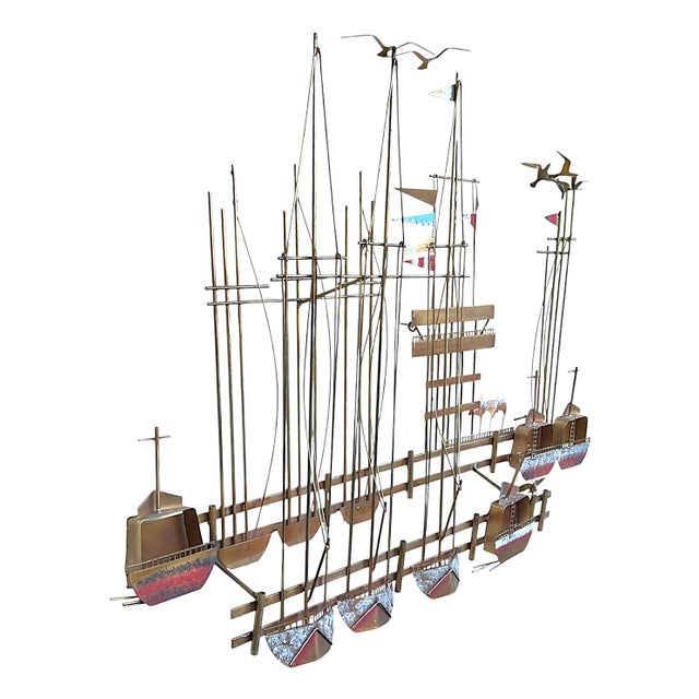 Add a touch of vintage coastal charm to your space with this striking 1980s wall sculpture signed by Curtis Jere. Expertly...