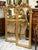 French Grand French-Style Gilded Wall Mirror – Ornate Floral Crest, Sculpted Foliage & Gold Leaf Frame For Sale - Image 3 of 5
