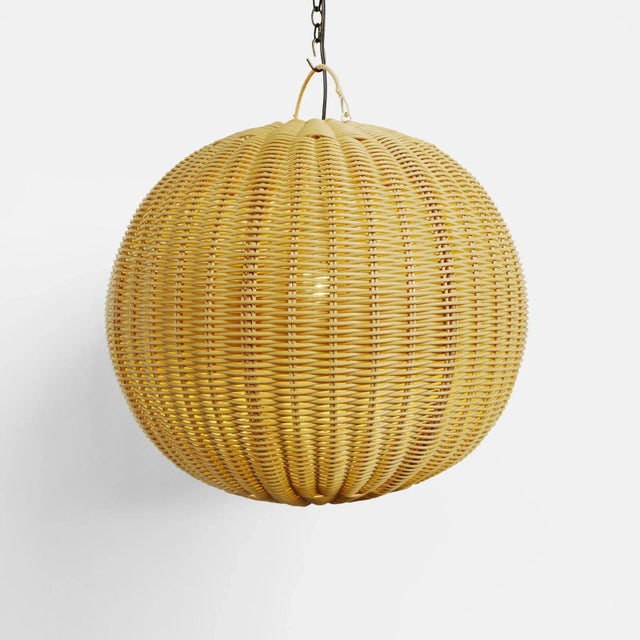 Outdoor faux rattan small globe lantern. Beautifully woven synthetic rattan with a natural wicker appearance. Rust-...