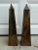 A pair of hand built soda fired ceramic obelisks in a variegated copper and brown glaze.