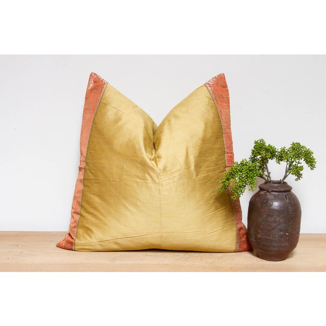 This brilliant silk euro pillow is a luxurious addition to any living room. Made out of silk with intricate borders of...