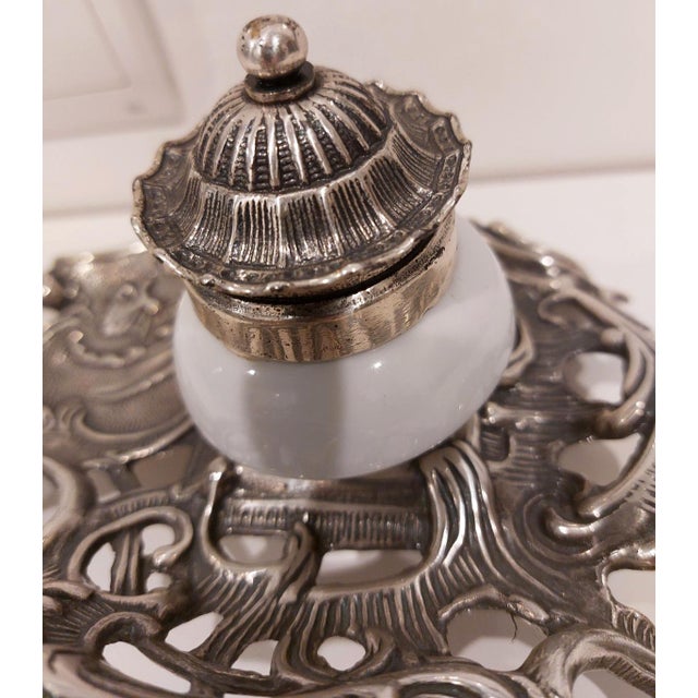 Antique inkwell or writing set with silver plating and marble, circa 1920. This silver-plated writing set dates from the...
