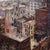 Standing in the Catbird Seat by Josh George | Mixed Media on Wood Panel Urban rooftops with buildings and power lines For Sale