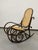 Small Thonet rocking chair no.10 for children. This piece is attributed to the mentioned designer/maker. It has no...