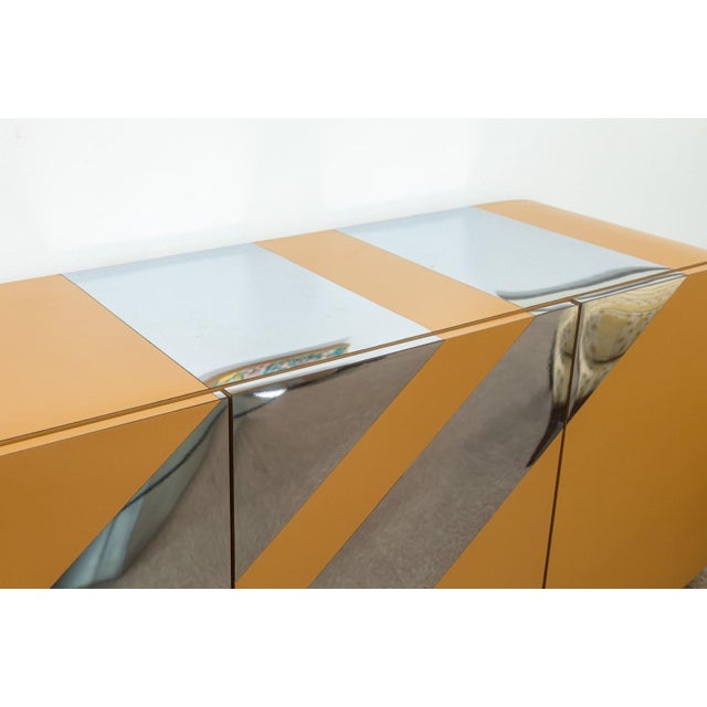 A custom made contemporary sideboard credenza. This wonderfully crafted custom made cabinet features a rounded rectangular...