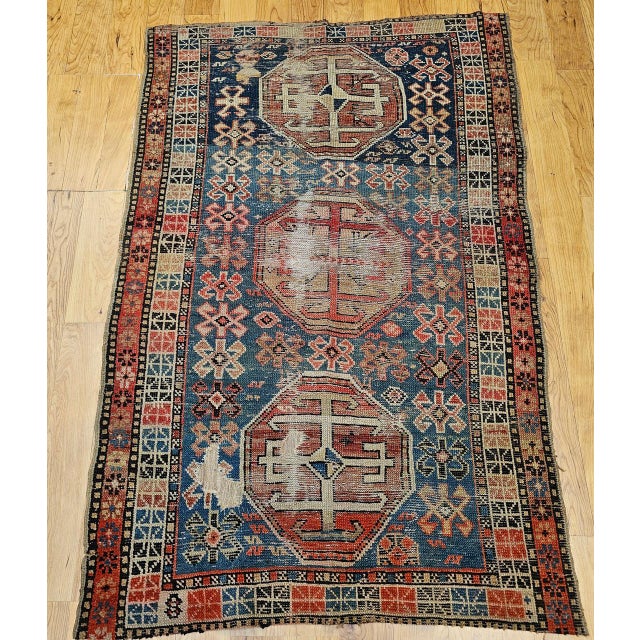 This exquisite 19th century Caucasian Shirvan area rug from the southern Azerbaijan region features a striking geometric...