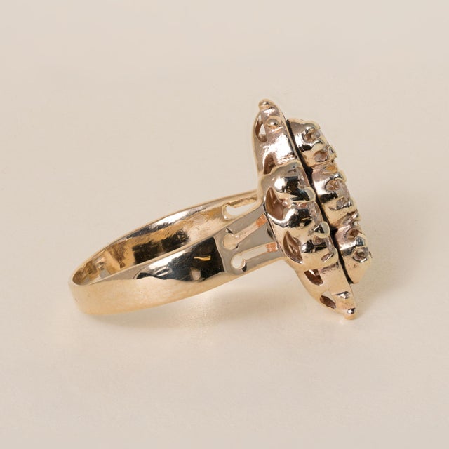 Lovely vintage diamond cluster ring inspired by Victorian-era design, beautifully reimagined during the 1960s Victorian...