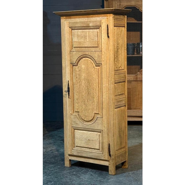 A lovely Solid Oak Armoire, French in origin and dating to around 1900. Good quality construction will lovely panelled...
