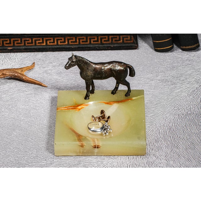 Bring a touch of vintage equestrian charm to your home with this circa 1930s polished onyx catchall. The smooth square...