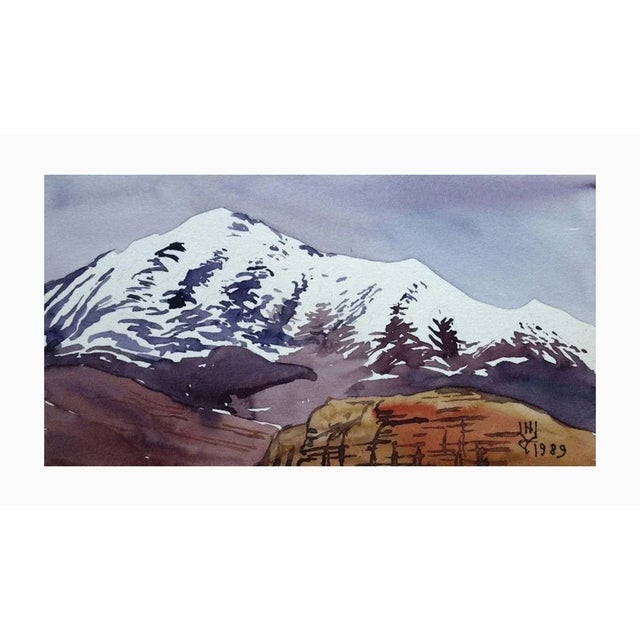 "Mountains" is a watercolor artwork created in 1989 on paper. The dimensions of the artwork are 11x21 cm. The painting...