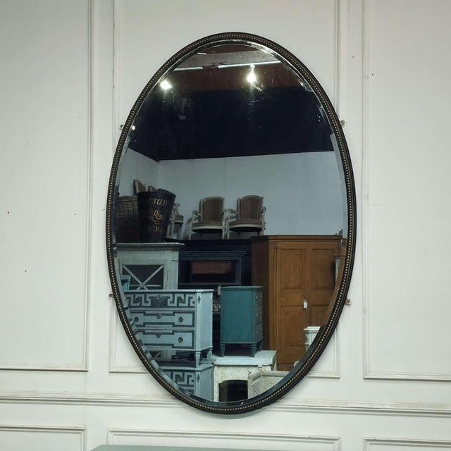 Huge Irish 19th C painted and gilt oval hall mirror, good bevelled plate. 1880 This piece is designed in the style of the...