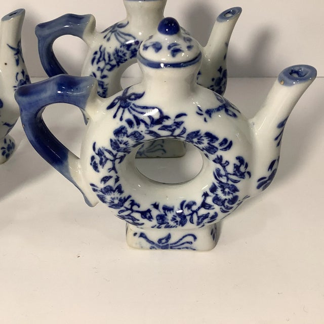 We love these whimsical hand painted Chinoiserie Napkin Rings. Fashioned in the shape of an Asian Tea Pot, they feature...