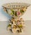 Gorgeous antique porcelain reticulated figural centrepiece compote decorated with Floweers and 3 figures of putti each...