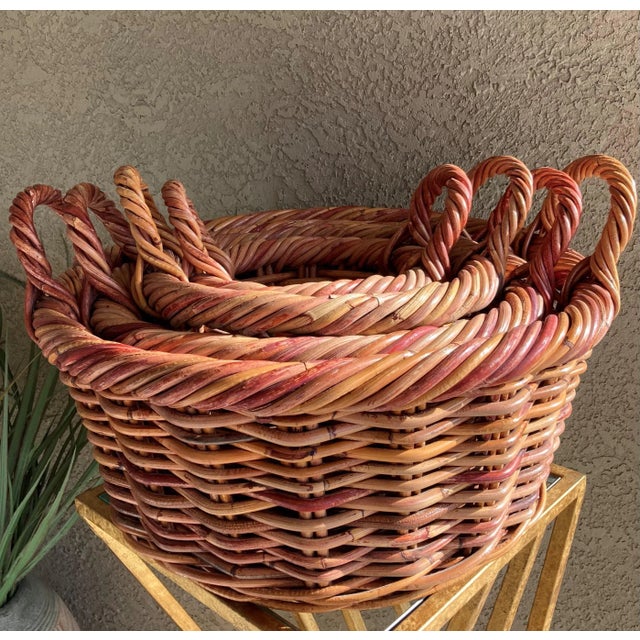 Excellent Pre-Owned Condition. Take a look at this artfully crafted set of nested baskets, four in all, graduated sizes...